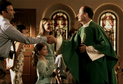 priest_welcomes_new _members