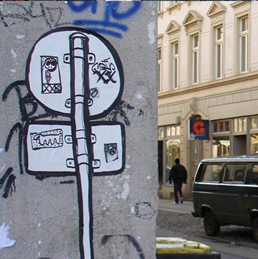signpost-sticker-street-art