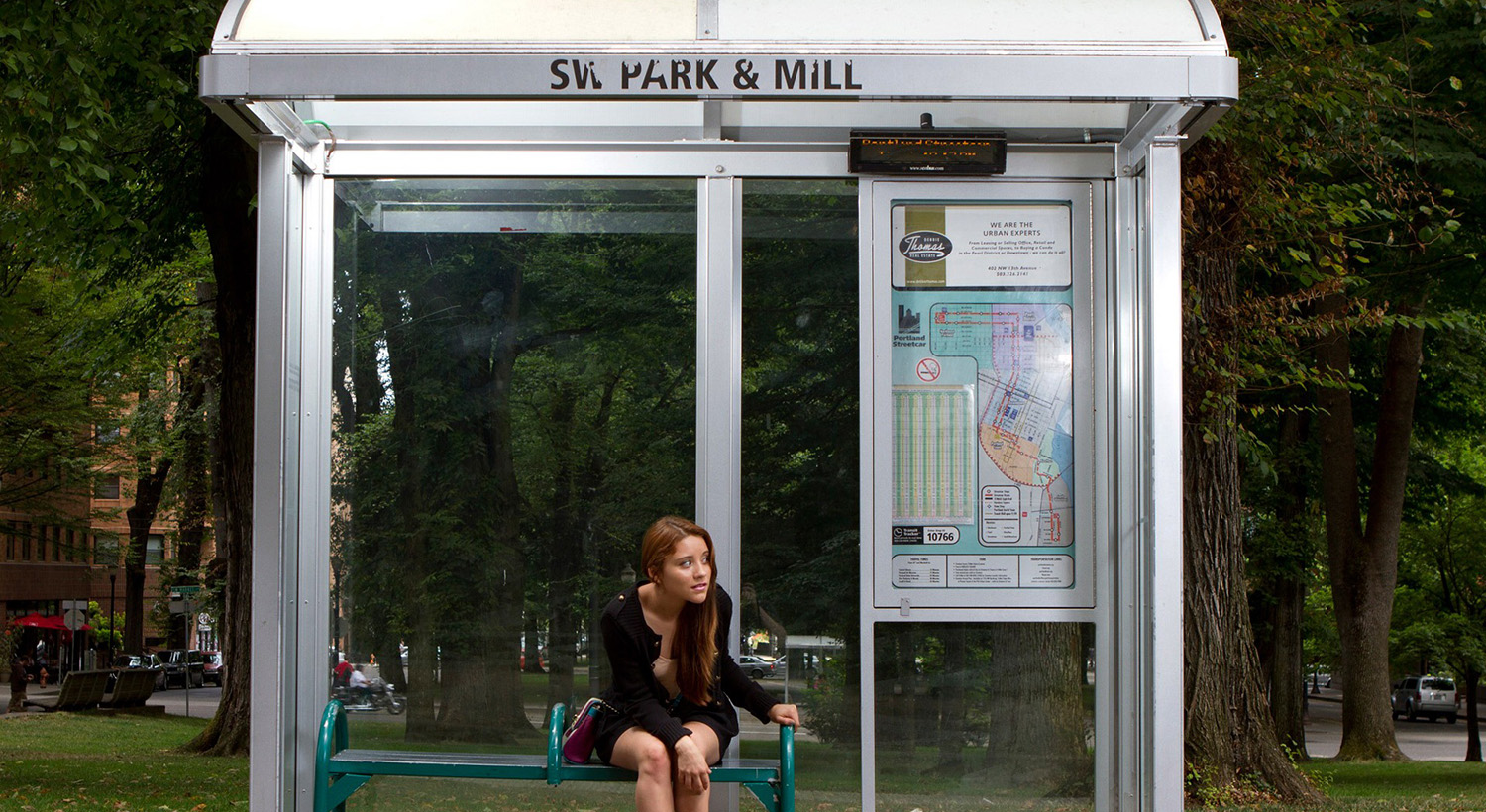 Hang flyers where people wait, such as a bus stop. Passenger waiting in a bus stop