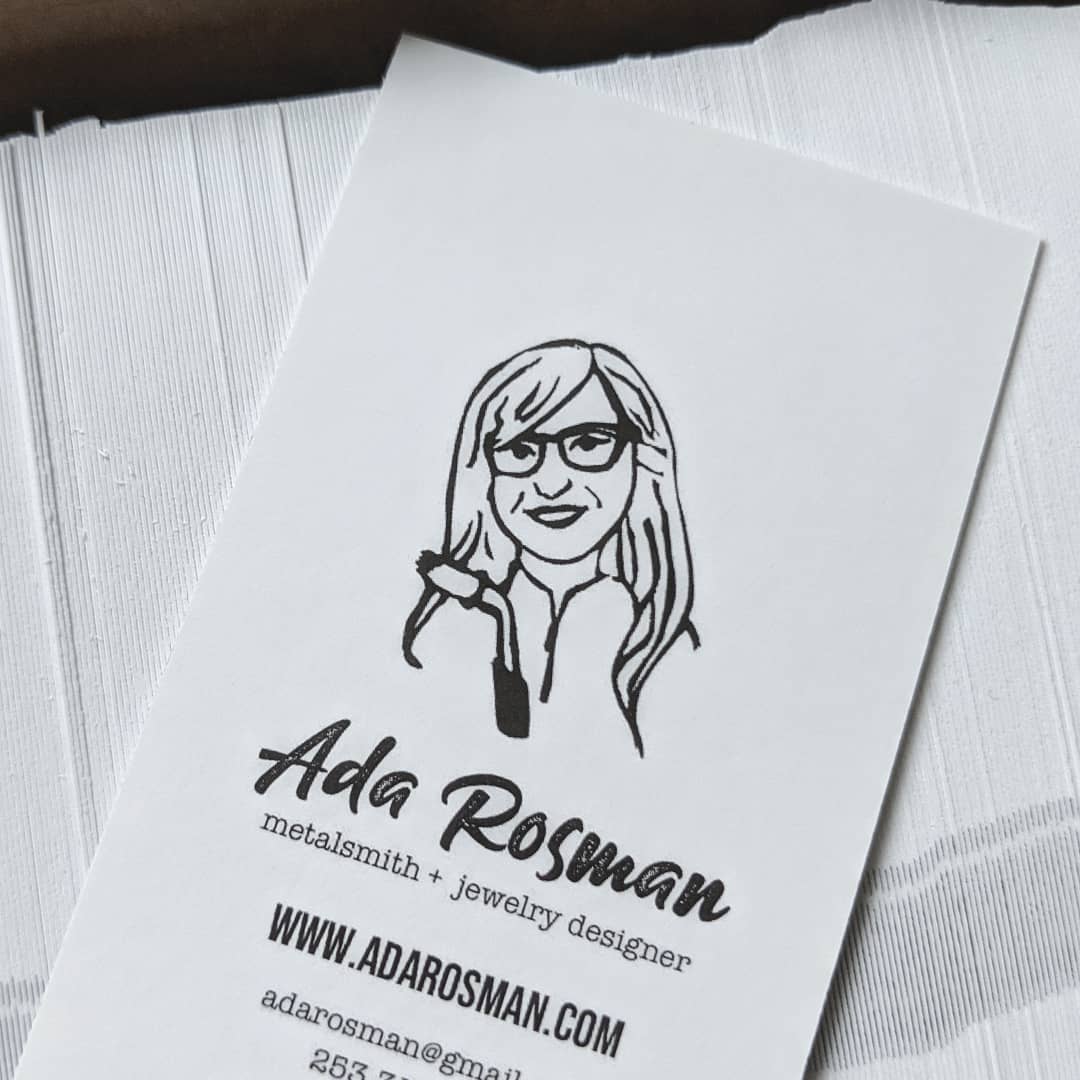 simple white business card with girl drawing