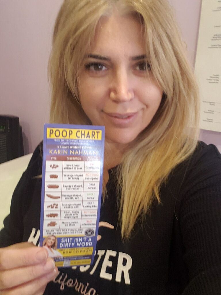 woman holding bookmarks